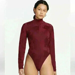 Sold out Nike Sportswear Tech Pack maroon Women's Bodysuit New $80